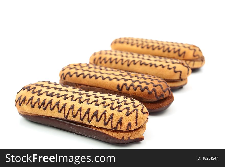 Cake with chocolate icing on a white background