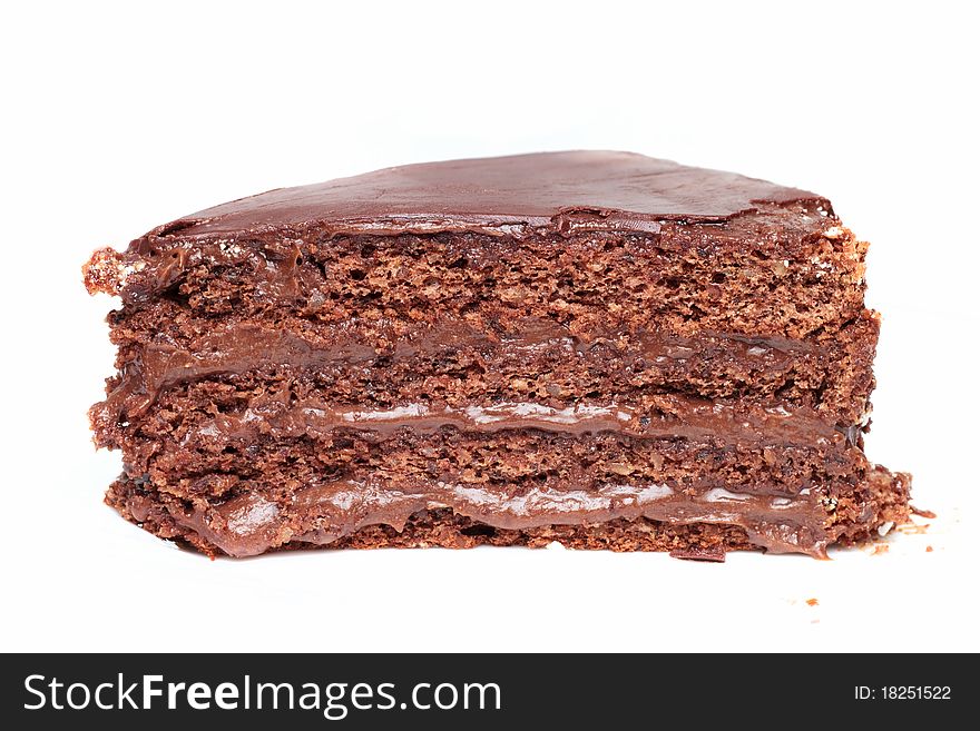 Shot of delicious chocolate cake isolated on white background