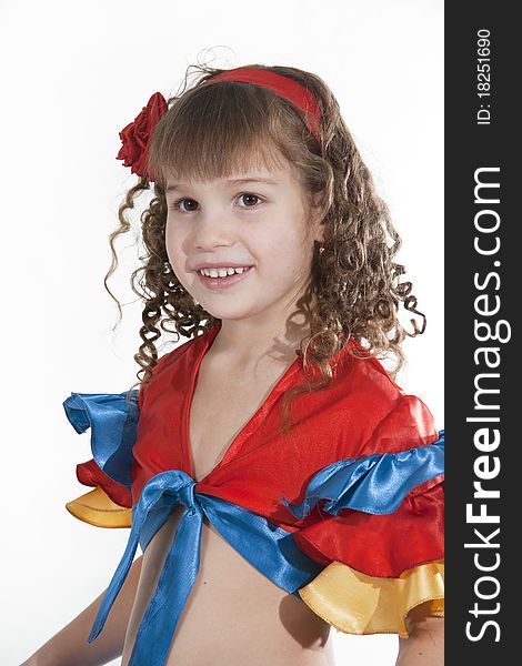 Portrait of the little girl dancer to a white background. Portrait of the little girl dancer to a white background