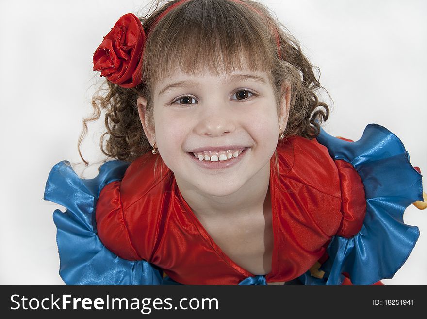 Portrait of the little girl dancer to a white background. Portrait of the little girl dancer to a white background