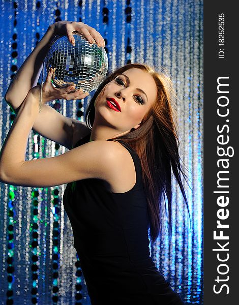 Attractive sexy woman clubbing dancing in disco