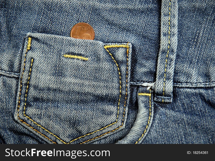 1 cent of euro in the pocket of a jeans