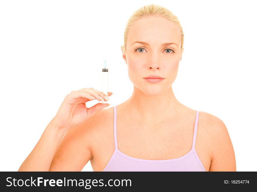 Woman with syringe of Botox in the white background