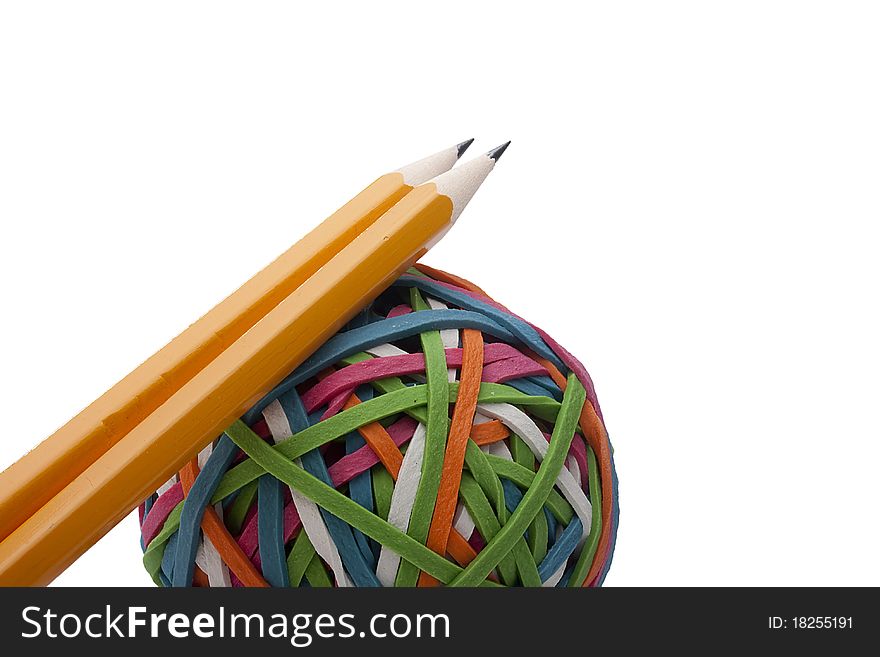 Rubber rings of different colors assembled for easy storage in a bowl with the office pencils. Rubber rings of different colors assembled for easy storage in a bowl with the office pencils.