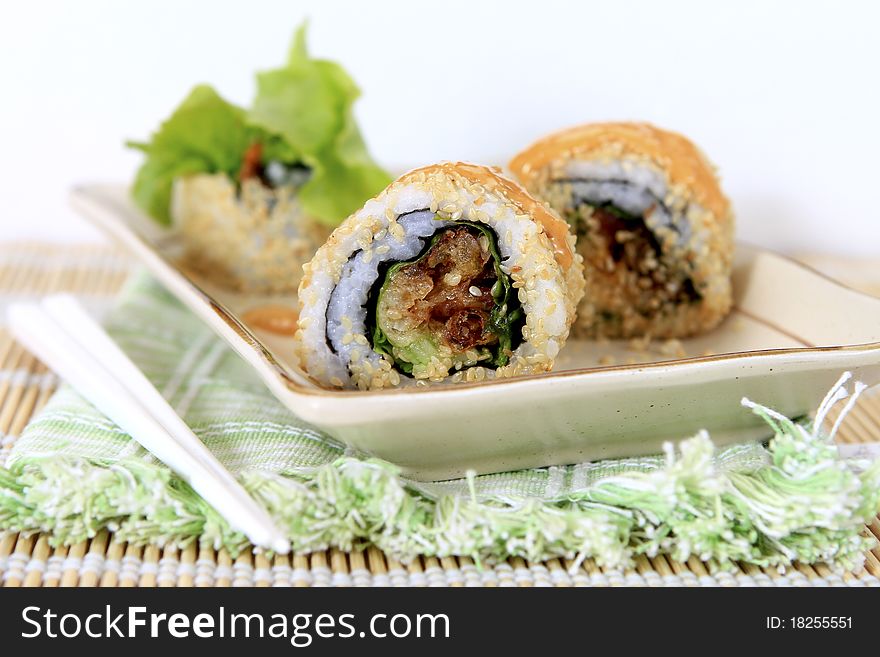 A sesami roll stuffed with crispy soft shelled crab. A light meal for diet.