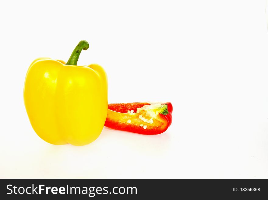 Yellow and Red sweet peppers isolated on a white background