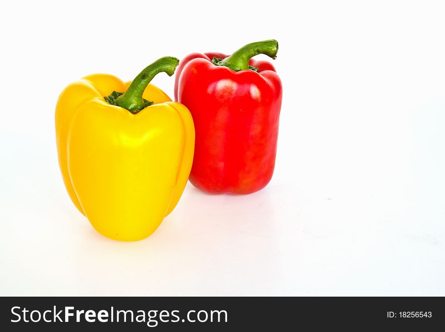 Yellow and Red sweet peppers isolated on a white background