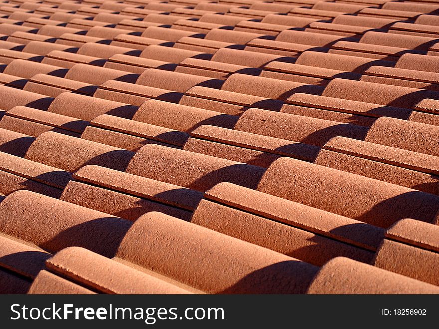 Red roof tiles pattern photo.