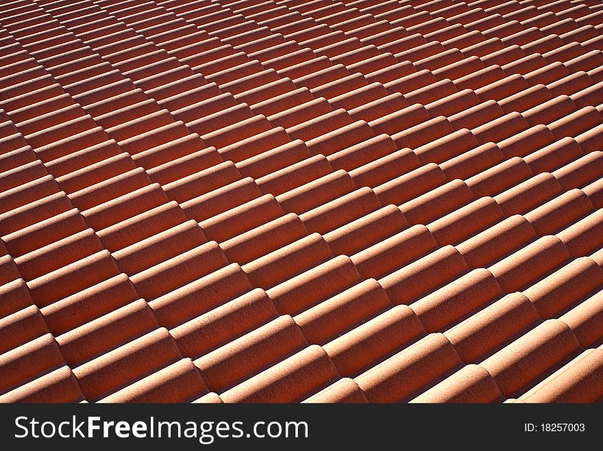 Red roof tiles pattern photo.