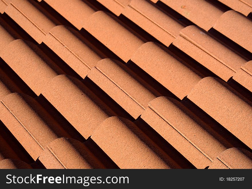 Red roof tiles pattern photo.