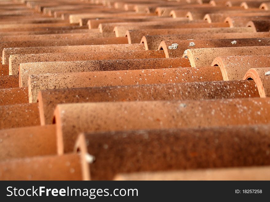 Red roof tiles pattern photo.