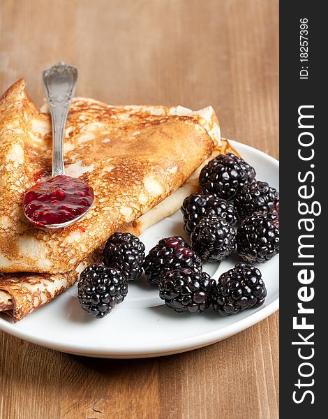 Plate of pancakes with fresh blackberries. Plate of pancakes with fresh blackberries