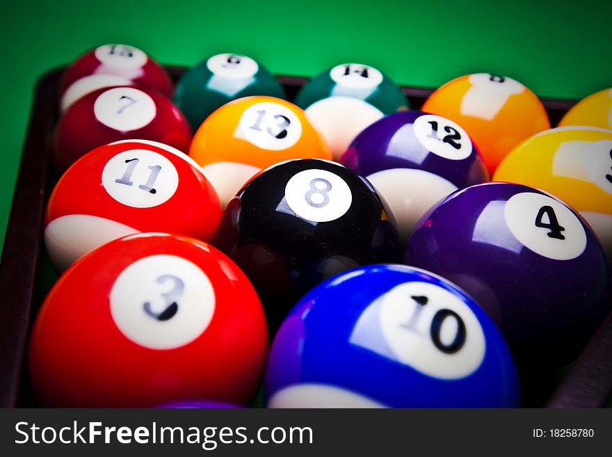 Billiard color balls over green table. Billiard color balls over green table