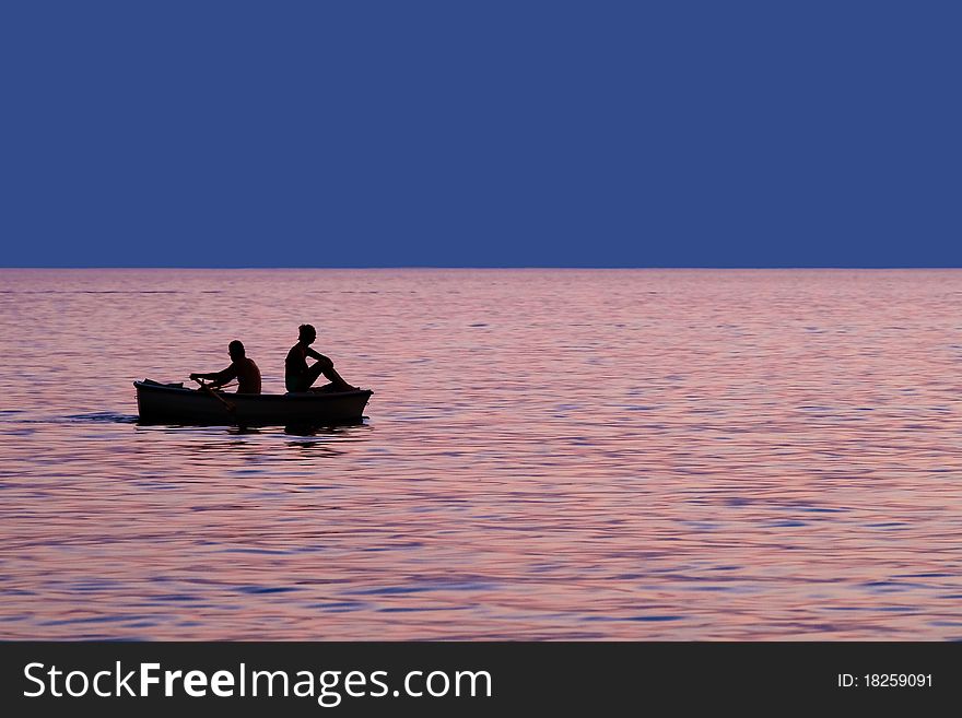 Heterosexual Couple in boat enjoy the ride