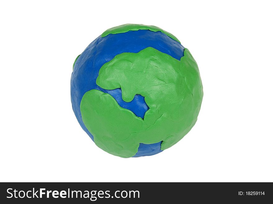 Model of the globe, made of clay, on white background. Model of the globe, made of clay, on white background