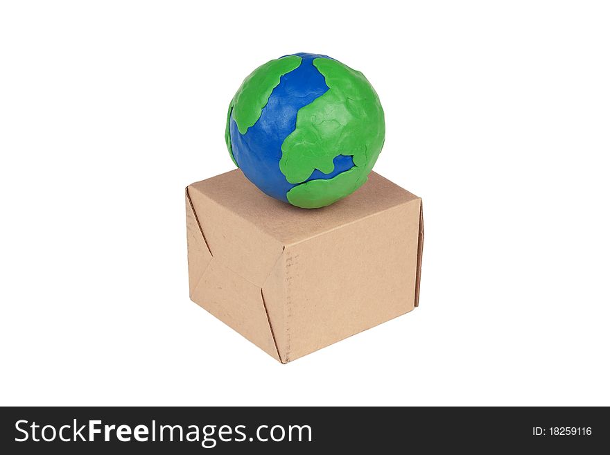The carton and model of the globe on a white background. The carton and model of the globe on a white background