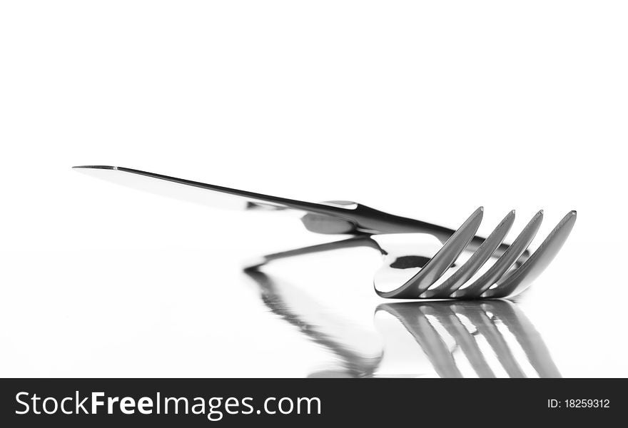 Fork and knife on white background