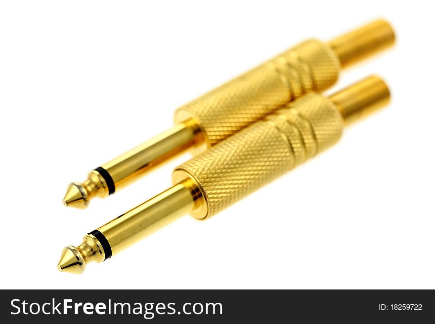 Gold plated audio connectors isolated on white background