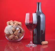 Black Bottle And Red Wine Stock Photo
