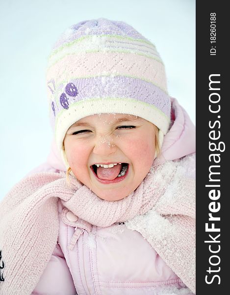 Little girl in winter parka. portrait