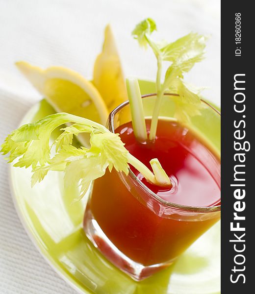 Fresh tomato juice or Bloody Mary with celery