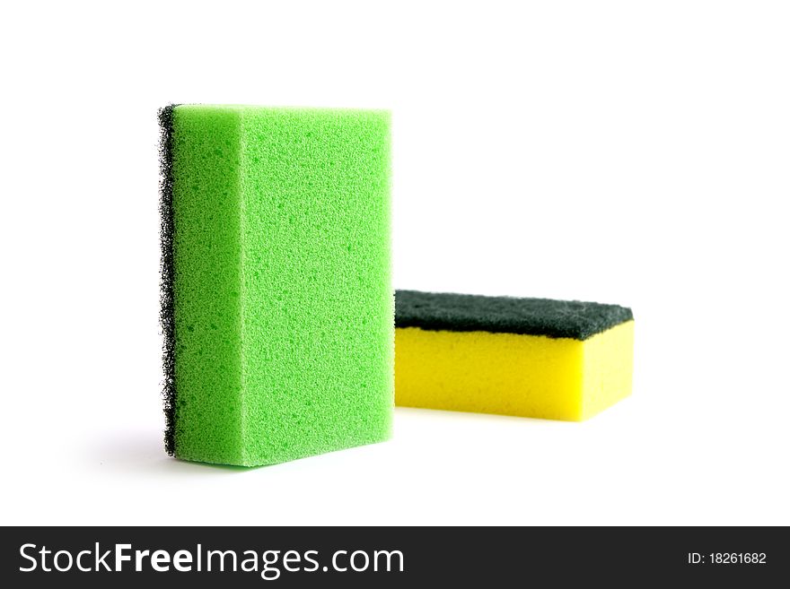 Highlights many-colored sponges isolated on white
