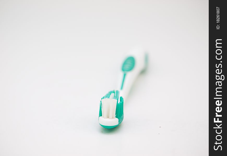 Tooth brush on a white background