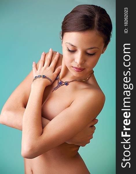 Portrait of a beautiful young woman in studio. Portrait of a beautiful young woman in studio