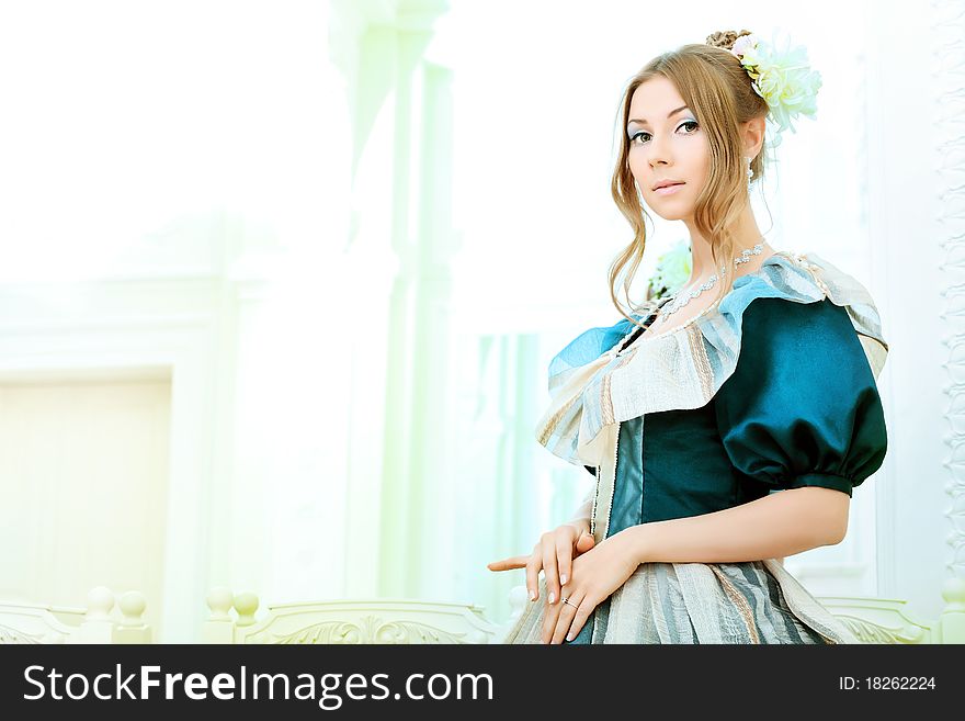 Portrait of a beautiful woman in medieval era dress. Portrait of a beautiful woman in medieval era dress.