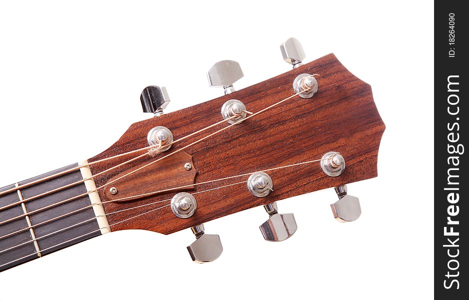 Headstock of the guitar over white background. Headstock of the guitar over white background