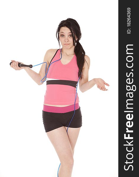 A woman with a jump rope around her neck. A woman with a jump rope around her neck.