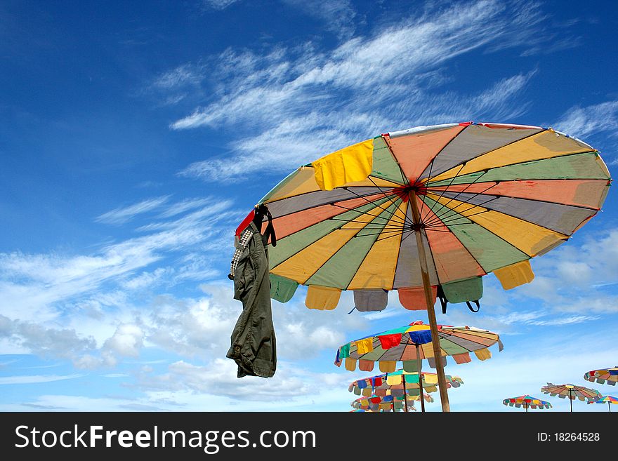 Colorful Beach Umbrella Against The Sun Light at Andaman Sea