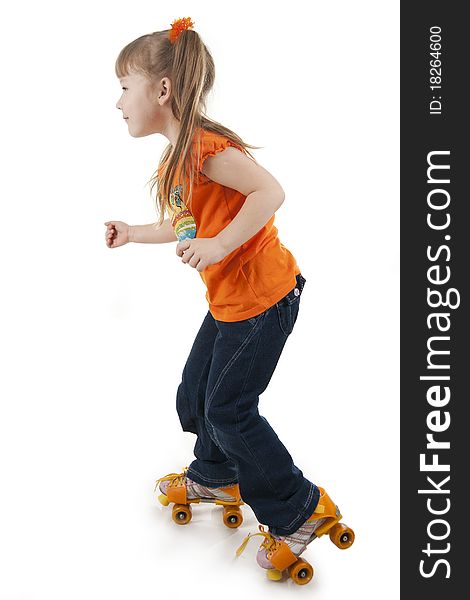 The little girl on roller skates. Isolated white