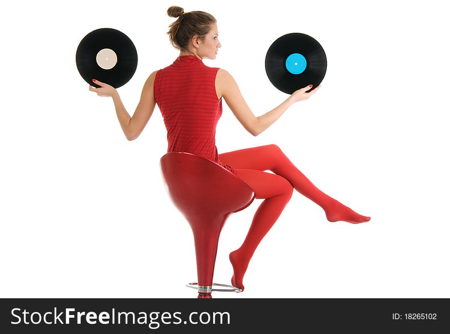 Young beautiful woman with vinyl records isolated in white
