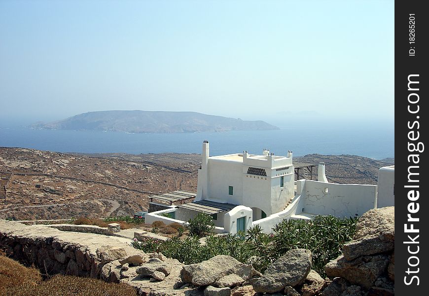 A landscape of a house on the Greek Island of Mykonos. A landscape of a house on the Greek Island of Mykonos.