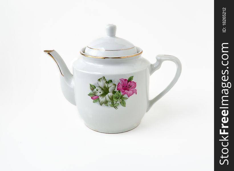 White Porcelain tea pot against white background. White Porcelain tea pot against white background