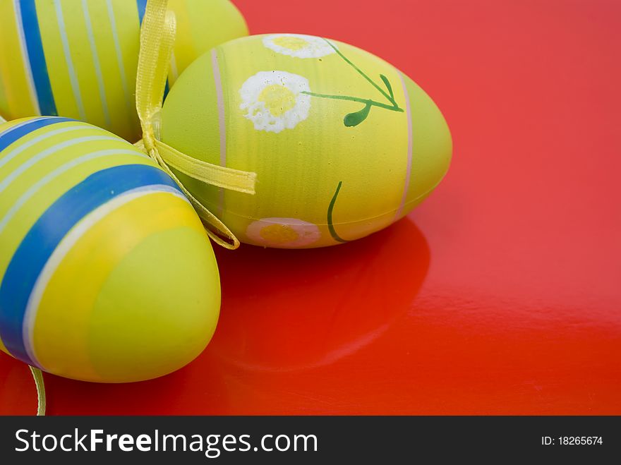 Easter eggs on red background