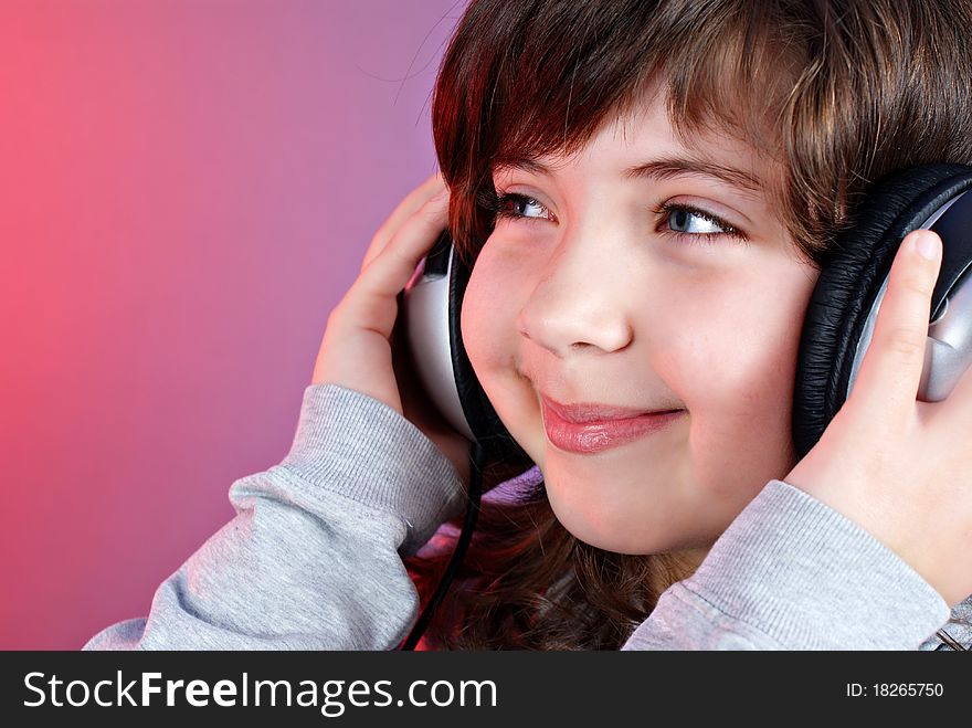 Cute little girl with earphones