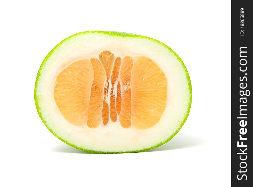 A half of green grapefruit (Jaffa sweetie) isolated on a white background. A half of green grapefruit (Jaffa sweetie) isolated on a white background