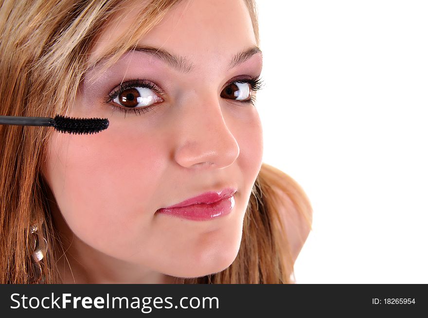 Young woman makeup with mascara eye closeup