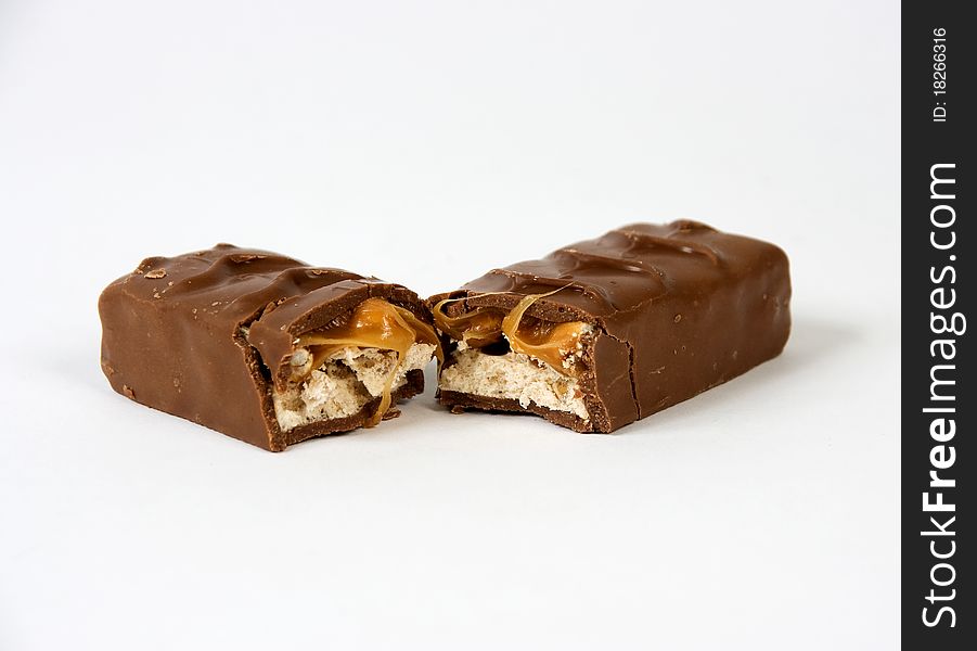 Chocolate and caramel on a white background. Chocolate and caramel on a white background