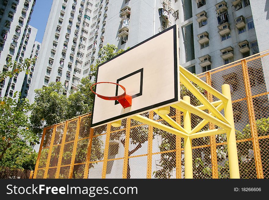 It is a very colorful basketball court in an university of Hong Kong. It is a very colorful basketball court in an university of Hong Kong.