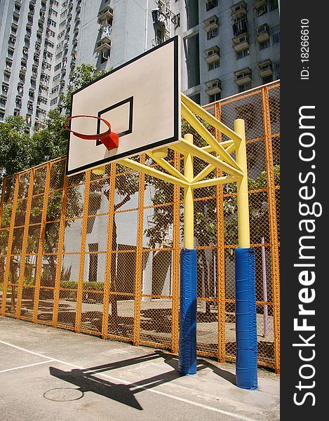 It is a very colorful basketball court in an university of Hong Kong. It is a very colorful basketball court in an university of Hong Kong.