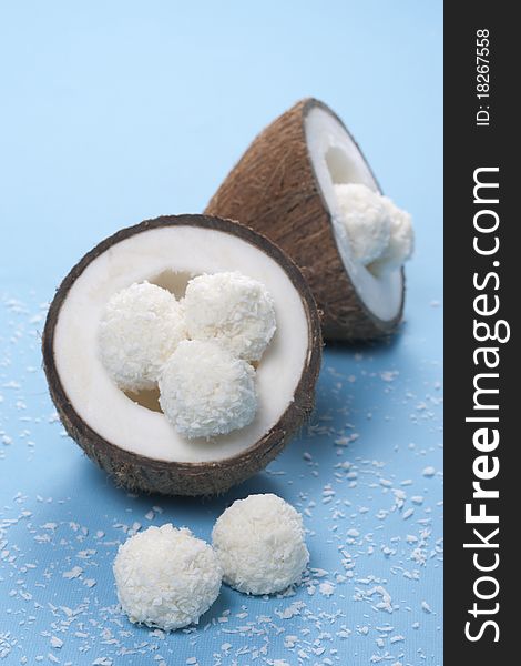 Homemade coconut sweets and fresh coconut. Homemade coconut sweets and fresh coconut