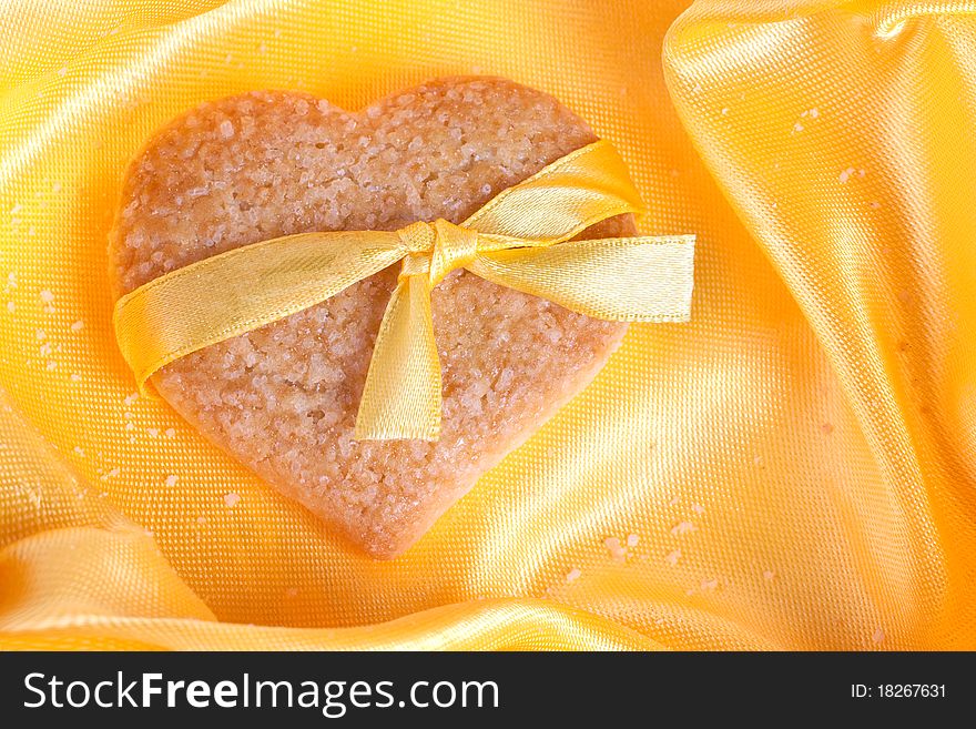 A Cookie In The Shape Of A Heart On A Silk