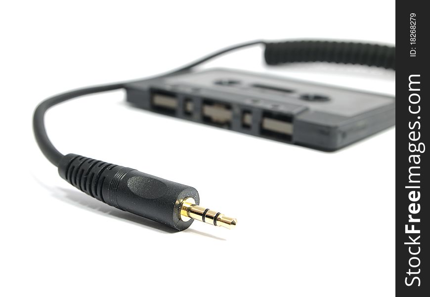 Closeup of a mini audio plug on w white background