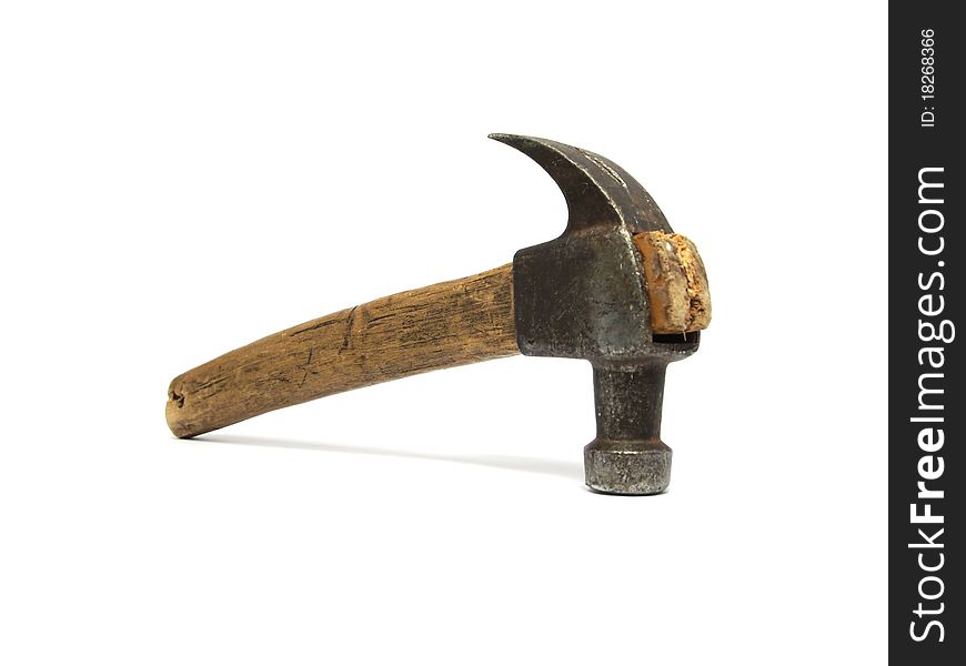Old hammer with the wood handle on a white background