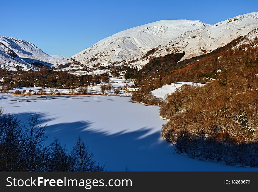 A view of a frozen Grasmere and Dunmail Raise, taken from Loughrigg Terrace in the English Lake District National Park