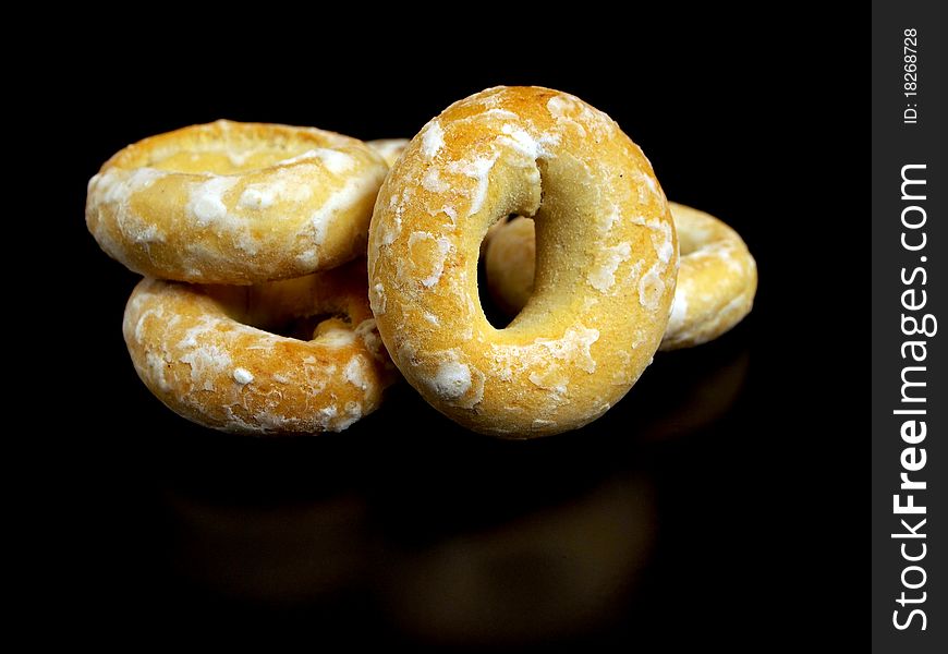 Ring bagels on a black background