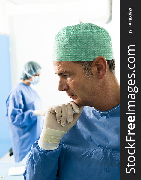 Portrait Of A Male Surgeon At Work